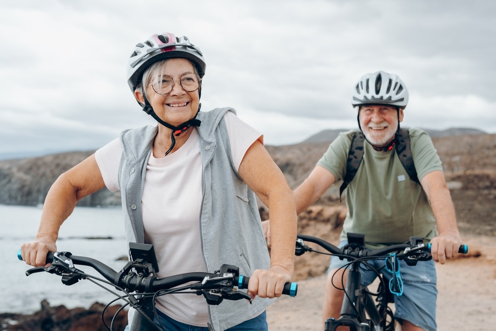 Utah Denture & Implant Center - Happy Couple With Snap-In Dentures